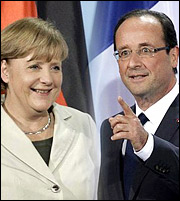 Merkel-Hollande: Θα κάνουμε τα πάντα για το ευρώ
