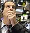 Συγκρατημένες απώλειες στη Wall Street